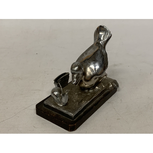 14 - AN ART DECO COCKTAIL STICK HOLDER BY FRENCH CARIACATURIST BENJAMIN RABIER FEATURING A WHITE METAL DU... 
