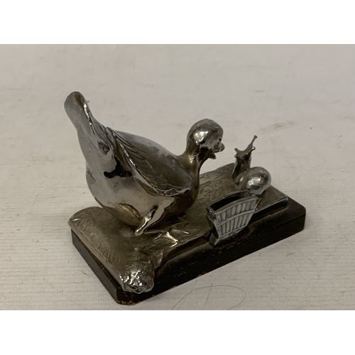 14 - AN ART DECO COCKTAIL STICK HOLDER BY FRENCH CARIACATURIST BENJAMIN RABIER FEATURING A WHITE METAL DU... 