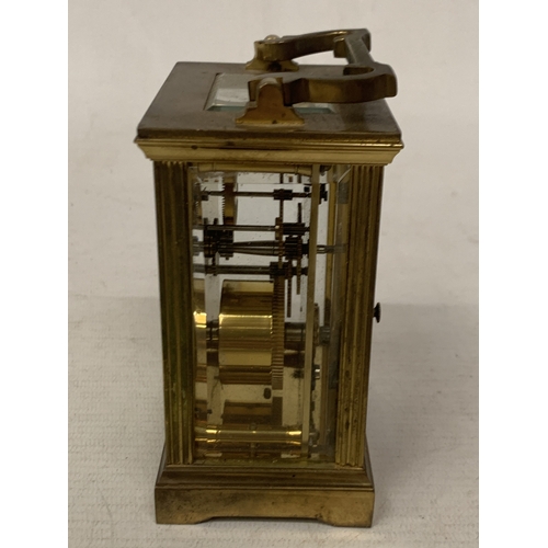 45 - A MAPPIN AND WEBB BRASS CARRIAGE CLOCK WITH GLASS ESCAPEMENT