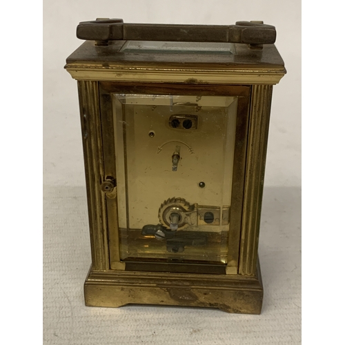 45 - A MAPPIN AND WEBB BRASS CARRIAGE CLOCK WITH GLASS ESCAPEMENT