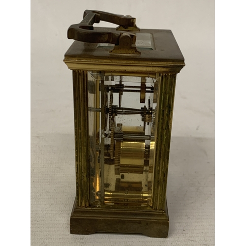 45 - A MAPPIN AND WEBB BRASS CARRIAGE CLOCK WITH GLASS ESCAPEMENT