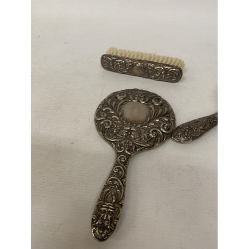2 - A HALLMARKED BIRMINGHAM SILVER THREE PIECE BRUSH AND MIRROR SET