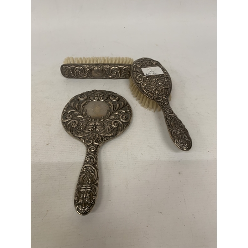 2 - A HALLMARKED BIRMINGHAM SILVER THREE PIECE BRUSH AND MIRROR SET