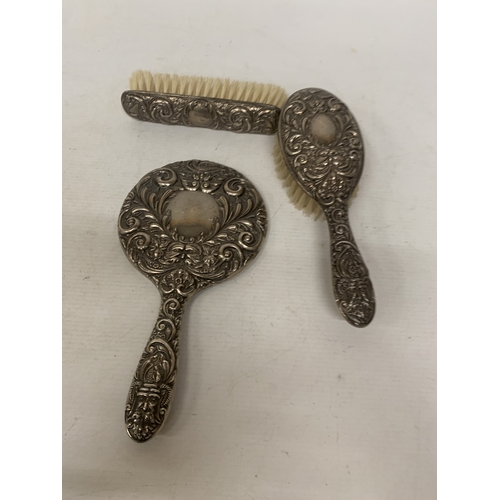 2 - A HALLMARKED BIRMINGHAM SILVER THREE PIECE BRUSH AND MIRROR SET