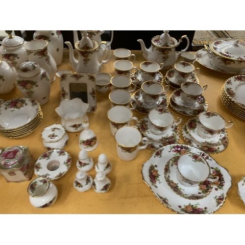 3 - APPROXIMATELY SEVENTY FIVE PIECES OF ROYAL ALBERT 'OLD COUNTRY ROSES' TO INCLUDE DINNER PLATES, TEA ... 
