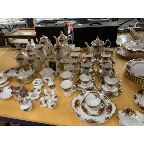 3 - APPROXIMATELY SEVENTY FIVE PIECES OF ROYAL ALBERT 'OLD COUNTRY ROSES' TO INCLUDE DINNER PLATES, TEA ... 