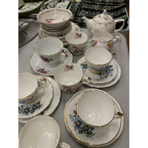 153 - A LARGE ASSORTMENT OF CUPS AND SAUCERS TO INCLUDE ROYAL VALE, ROYAL STAFFORD ETC
