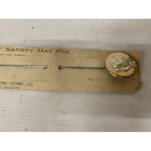 186 - A BOXED 'NORENE' VINTAGE BRASS HAT PIN