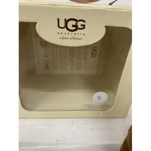 188 - A BOXED PAIR OF CHILDRENS MOCCASSIN BOOTS MARKED 'UGG'