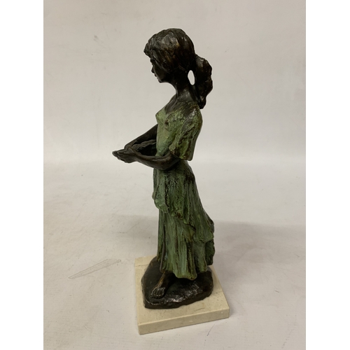 29 - A BRONZE SCULPTURE OF A YOUNG DUTCH GIRL HOLDING A BASKET IN THE STYLE OF WORKS BY SWEDISH ARTIST RU... 