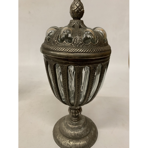 33 - A DECORATIVE LIDDED URN WITH BUBBLE GLASS, PINEAPPLE SHAPED FINIAL ENCASED IN PEWTER - APPROX 32.5 C... 