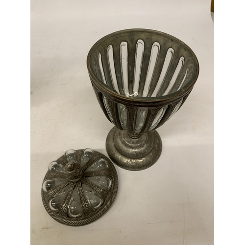 33 - A DECORATIVE LIDDED URN WITH BUBBLE GLASS, PINEAPPLE SHAPED FINIAL ENCASED IN PEWTER - APPROX 32.5 C... 
