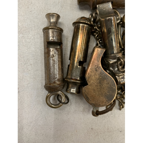 43 - A COLLECTION OF WHISTLES TO INCLUDE A METROPOLITAN POLICE WHISTLE BY J.D. HUDSON & CO., BIRMINGHAM, ... 