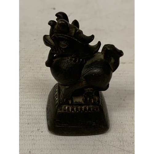 45 - A VINTAGE BRONZE ORIENTAL FOO DOG