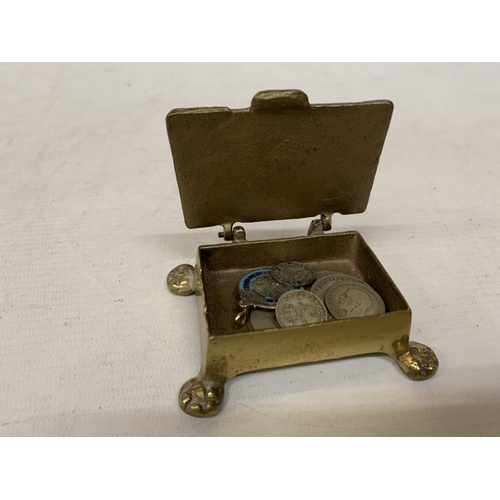 51 - A BRASS TRINKET BOX CONTAINING ASSORTED PRE 1947 SILVER COINS, ONE SHILLING, THREEPENCES AND A GEORG... 