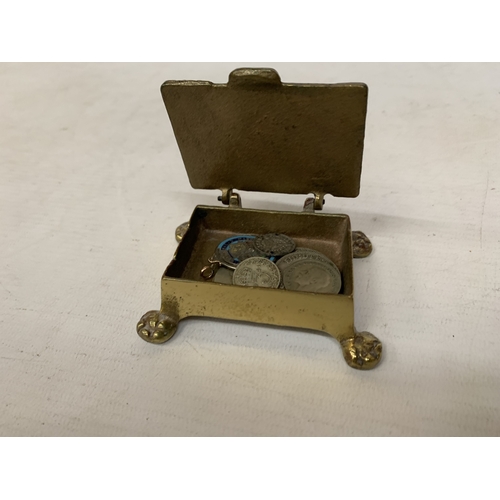 51 - A BRASS TRINKET BOX CONTAINING ASSORTED PRE 1947 SILVER COINS, ONE SHILLING, THREEPENCES AND A GEORG... 