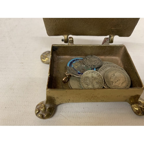 51 - A BRASS TRINKET BOX CONTAINING ASSORTED PRE 1947 SILVER COINS, ONE SHILLING, THREEPENCES AND A GEORG... 