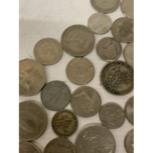 53 - A BAG OF WORLD COINS, USA QUARTER DOLLARS, NEW ZEALAND ONE FLORINS, ETC.,