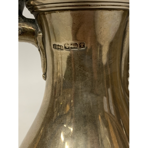 1 - A LATE 19TH CENTURY HALLMARKED LONDON SILVER COFFEEPOT WITH A PYRIFORM BODY WITH LOBED FLUTING TO TH... 