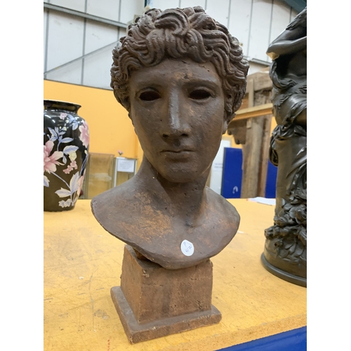 13 - A STONE BUST WITH A BRONZED FINISH INSPIRED BY THE BENEVENTO HEAD ALSO KNOWN AS THE HEAD OF A VICTOR... 