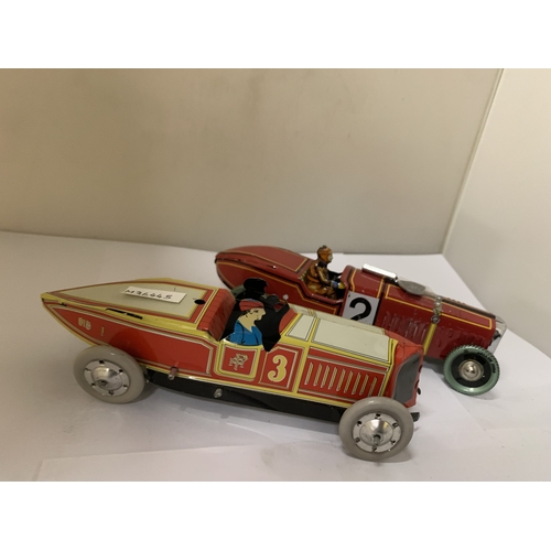 TWO TIN PLATE CLOCKWORK MODELS OF CARS - WITH KEYS