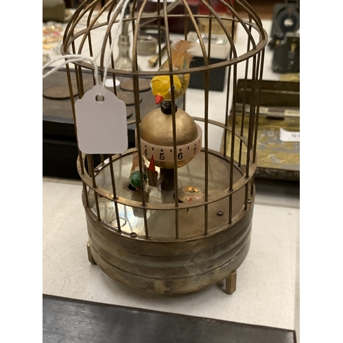 187 - A BRASS BIRD CAGE CLOCK