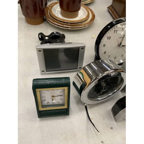 199 - AN ASSORTMENT OF SMALL ALARM CLOCKS
