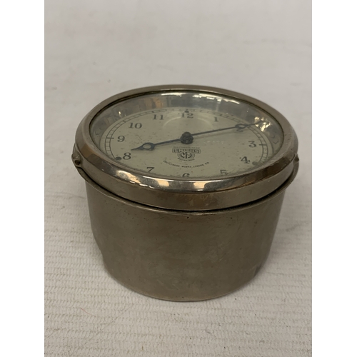 13 - A VINTAGE 1930'S SMITH'S CAR DASHBOARD CLOCK, WITH A WHITE DIAL AND BLUE HANDS, MADE BY THE CRICKLEW... 
