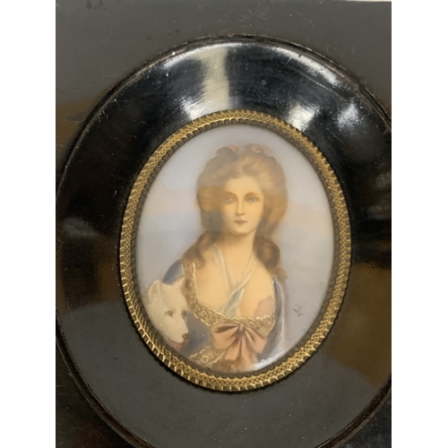 14 - TWO MINIATURE HAND PAINTED CEARAMIC PORTRAITS IN WOODEN FRAMES