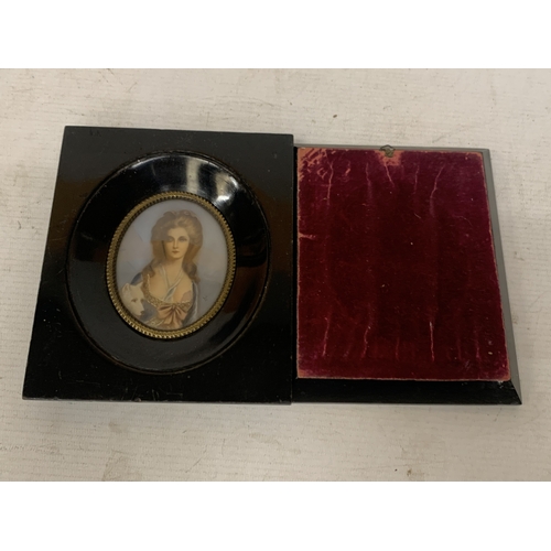 14 - TWO MINIATURE HAND PAINTED CEARAMIC PORTRAITS IN WOODEN FRAMES