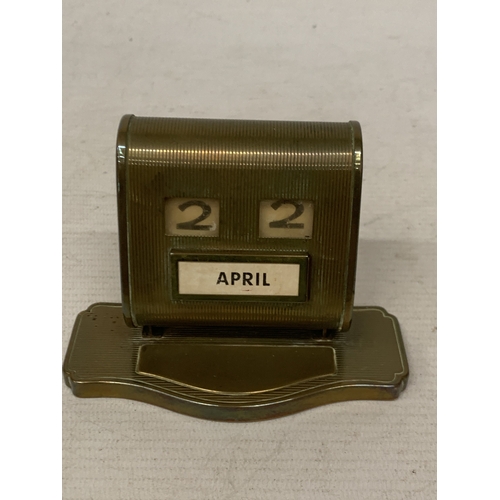 21 - A 1930'S BRASS PERPETUAL DESK CALENDAR