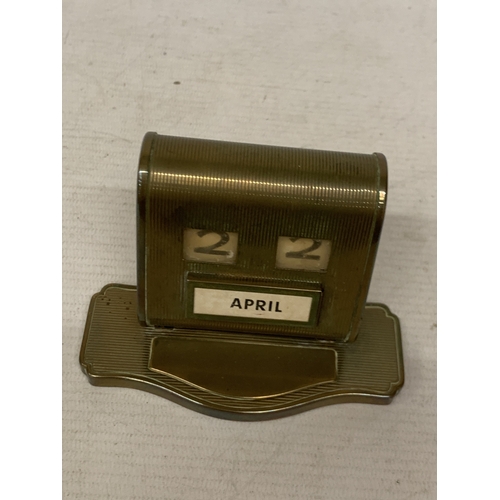 21 - A 1930'S BRASS PERPETUAL DESK CALENDAR