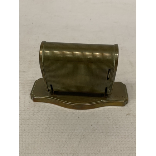 21 - A 1930'S BRASS PERPETUAL DESK CALENDAR