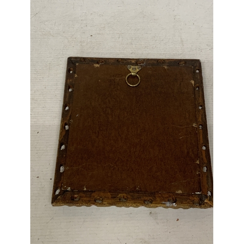 22 - A VINTAGE HAND PAINTED PORTRAIT ON A CERAMIC PLAQUE, IN A GILT AND VELVET FRAME