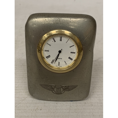 23 - A VINTAGE PEWTER BENTLEY CLOCK