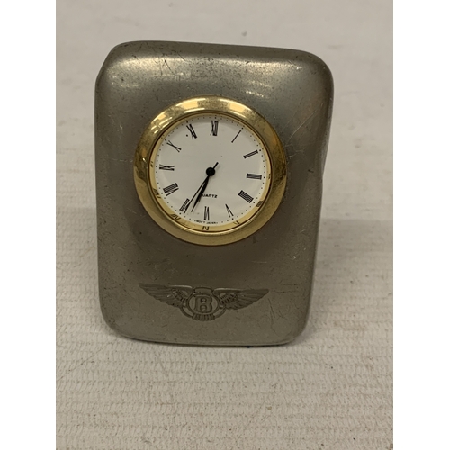 23 - A VINTAGE PEWTER BENTLEY CLOCK
