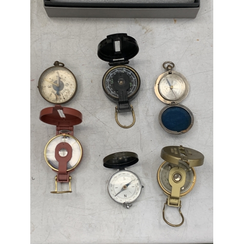 26 - A COLLECTION OF SIX COMPASSES