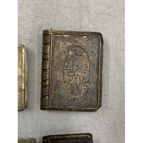 32 - FOUR VINTAGE WHITE METAL RELIGIOUS THEMED VESTA CASES