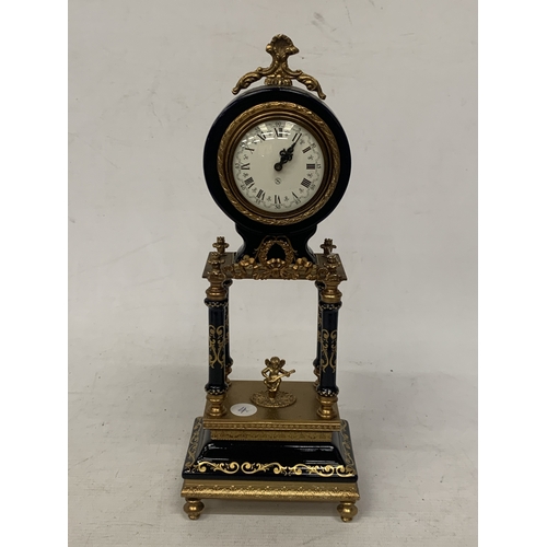 9 - A BRASS AND ENAMEL MANTLE CLOCK, CHIMES ON THE QUARTER HOUR