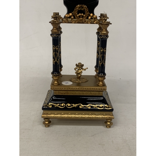 9 - A BRASS AND ENAMEL MANTLE CLOCK, CHIMES ON THE QUARTER HOUR