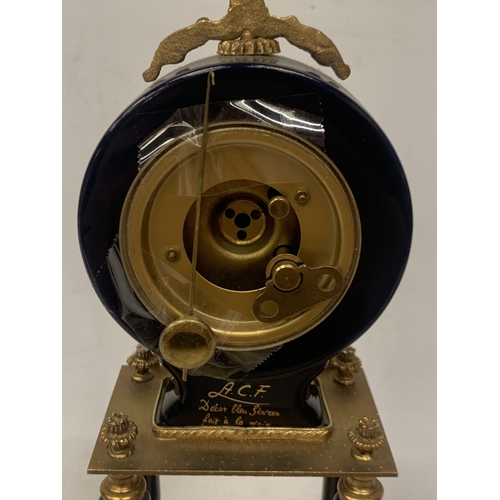 9 - A BRASS AND ENAMEL MANTLE CLOCK, CHIMES ON THE QUARTER HOUR