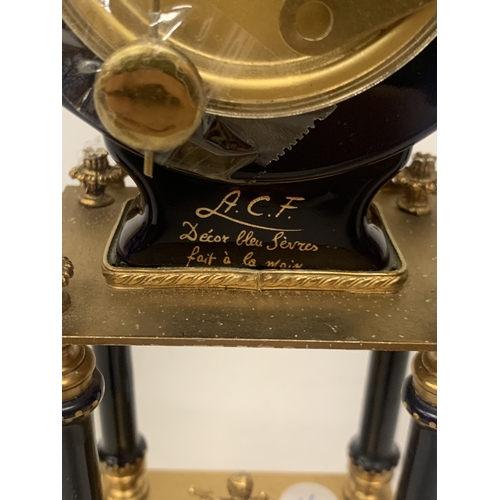 9 - A BRASS AND ENAMEL MANTLE CLOCK, CHIMES ON THE QUARTER HOUR