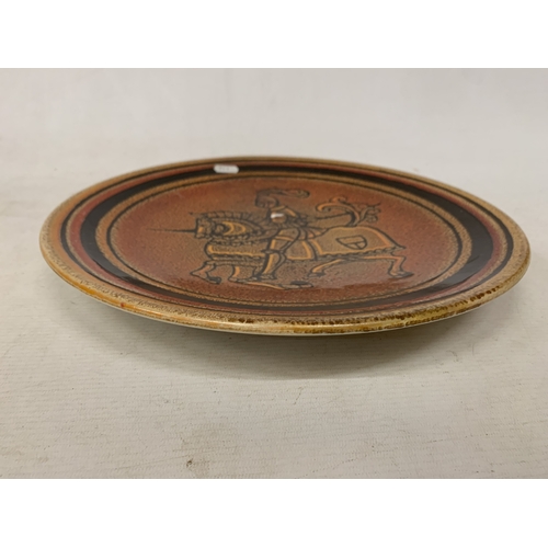41 - A POOLE POTTERY AEGEAN RANGE CHARGER OF A MEDIEVAL KNIGHT ON A HORSE, DIAMETER 35CM