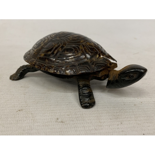 54 - A VINTAGE NOVELTY TABLE BELL IN THE SHAPE OF A TORTOISE WITH A CAST BRONZE BASE - A/F
