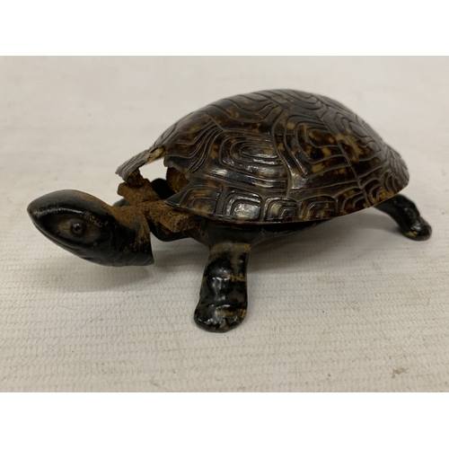 54 - A VINTAGE NOVELTY TABLE BELL IN THE SHAPE OF A TORTOISE WITH A CAST BRONZE BASE - A/F