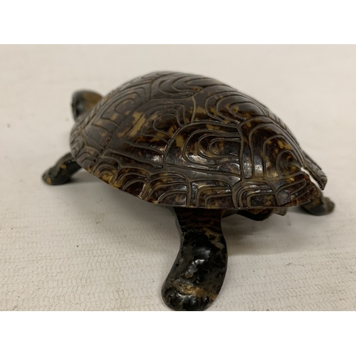 54 - A VINTAGE NOVELTY TABLE BELL IN THE SHAPE OF A TORTOISE WITH A CAST BRONZE BASE - A/F