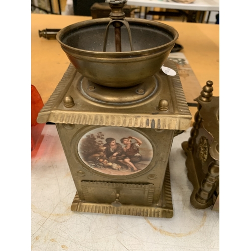 16 - TWO VINTAGE BRASS COFFEE GRINDERS, ONE WITH A CERAMIC PLAQUE TO THE FRONT