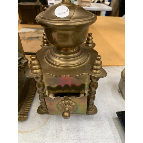 16 - TWO VINTAGE BRASS COFFEE GRINDERS, ONE WITH A CERAMIC PLAQUE TO THE FRONT