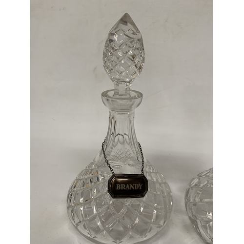 2 - THREE VINTAGE CUT GLASS DECANTERS WITH HALLMARKED SILVER LABELS AND HALLMARKED SILVER RIMS TO TWO OF... 