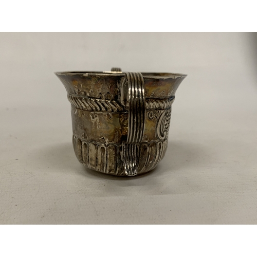 30A - A SILVER TWIN HANDLED CUP WITH REPOUSSE DECORATION - WEIGHT 59.34 G